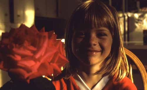 Missy with a red rose
